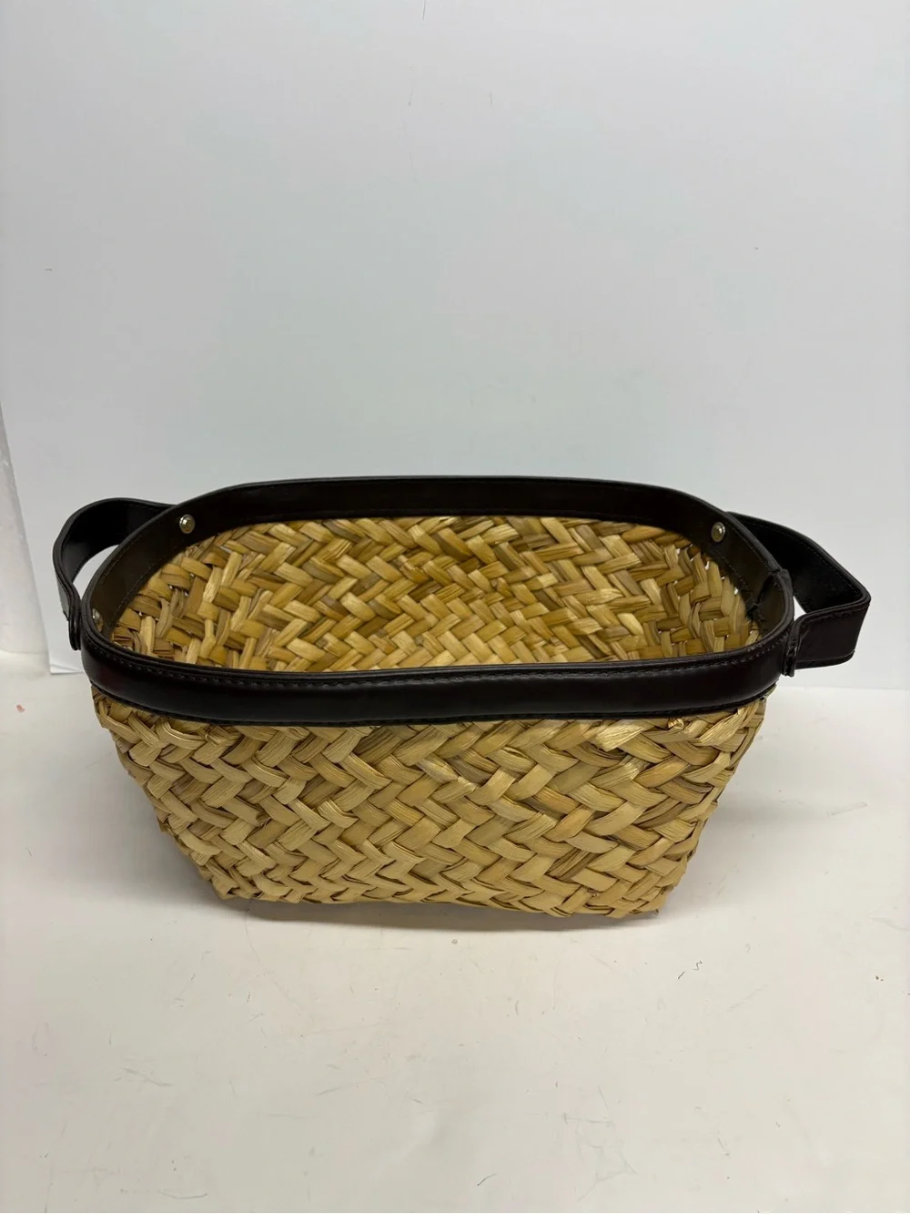 Woven Straw Handled Basket with Dark Brown Leather Trim 14x10x6.5”